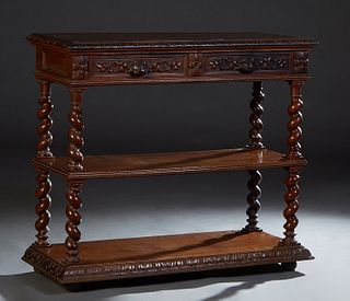French Provincial Henri II Style Carved Oak Serving Trolley, c. 1880, the carved edge top opening to an inset figured white marble, above two frieze d