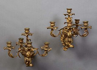 Pair of Gilt Bronze Five Light Wall Sconces, 20th c., of foliate form, with a central candle cup on a leaf support above four like candle arms with li