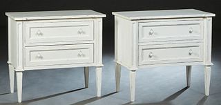 Pair of Polychromed Mahogany Two Drawer Nightstands, 20th/21st c., the breakfront top over two setback drawers, flanked by indented pilasters, on tape