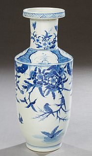 Chinese Blue and White Baluster Vase, 20th c., of tapered form, the everted rim over bamboo decorated shoulders above a landscape with birds, the unde