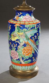 Chinese Porcelain Baluster Vase, early 20th c., with large floral decoration on a bright blue ground, now mounted as a lamp on a brass base, H.- 14 in