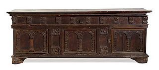 * A Continental Carved Cassone Height 19 x width 54 x depth 21 inches.