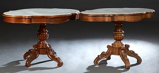 Two French Provincial Carved Walnut Center Tables, 19th c., the inset figured white tortoise top marble, over a conforming skirt with two opposing fri