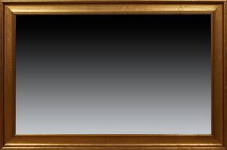 Large American Gilt Overmantel Mirror, 20th c., the wide cove molded frame around a rectangular plate, H.- 46 5/8 in., W.- 70 1/8 in., D.- 2 3/4 in. P