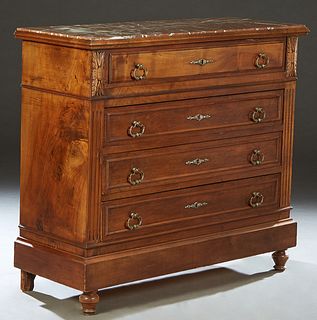 French Carved Walnut Marble Top Commode, c. 1870, the inset highly figured brown marble over a frieze drawer and three lower drawers, flanked by reede