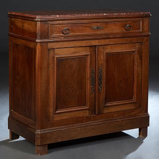 French Provincial Louis Philippe Carved Walnut Marble Top Sideboard, 19th c., the inset canted corner highly figured rouge marble over two frieze draw
