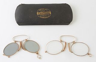 2 Pair of 14K Yellow Gold Pince Nez Glasses, early 20th c., in a period carrying case marked "E. Claude Optical, New Orleans".