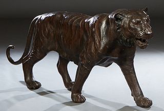 Patinated Bronze Life-Size Tiger, 20th/21st c., H.- 32 in., W.- 15 in., D.- 86 in.