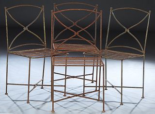 Set of Four Wrought Iron Garden Side Chairs, 20th/21st c., the arched back with an X-form splat, over a slatted strapwork seat, on cylindrical legs jo