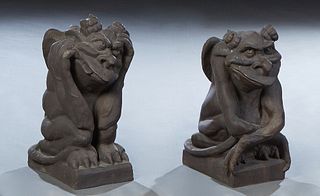Pair of Cast Resin Gargoyle Garden Ornaments, 20th c., on integral rectangular bases, H.- 20- in., W.- 10 in., D.- 16 in.