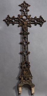 French Cast Iron Garden Cross, 19th c., of pierced design with a central relief of Jesus, above a kneeling angel, H.- 60 1/4 in., W.- 29 in., D.- 2 3/