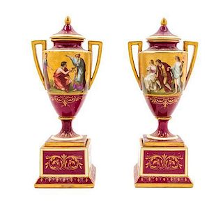 * A Pair of Royal Vienna Porcelain Urns Height 11 1/2 inches.