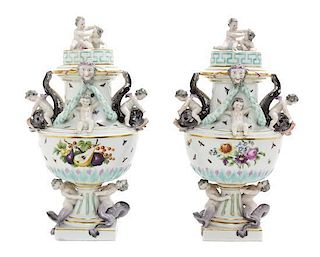 A Pair of Meissen Porcelain Covered Urns Height 11 inches.