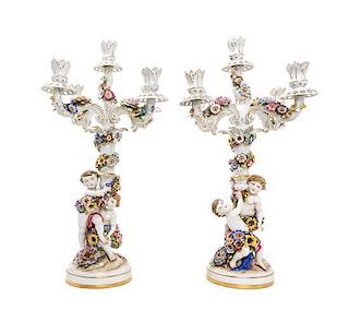 A Pair of Schierholz Porcelain Three-Light Candelabra Height 23 1/2 inches.