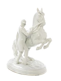 * An Augarten Blanc de Chine Equestrian Group Height 9 1/4 inches.