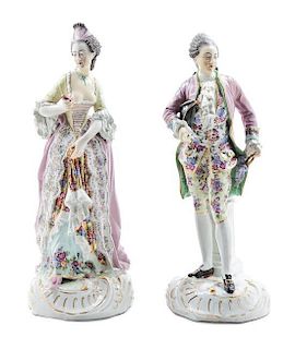 * A Pair of Continental Porcelain Figures Height 17 1/2 inches.
