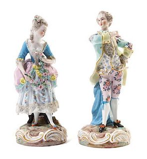* A Pair of Continental Porcelain Figures Height 9 inches.