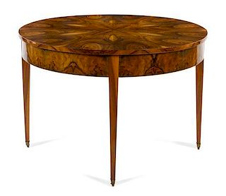 * A Biedermeier Nutwood Flip-Top Game Table Height 29 5/8 x width 44 x depth when closed 21 5/8 inches.