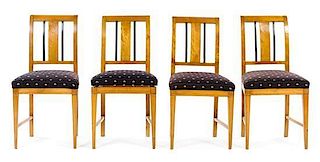 * A Set of Four Biedermeier Parcel Ebonized Satinwood Side Chairs Height 34 inches.