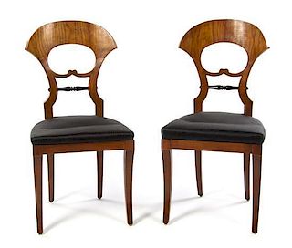 * A Pair of Biedermeier Birch and Ebonized Side Chairs Height 37 x width 18 1/4 x depth 16 1/4 inches.