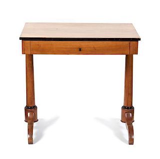 A Biedermeier Partial Ebonized Writing Table Height 29 3/4 x width 31 1/4 x depth 22 inches.