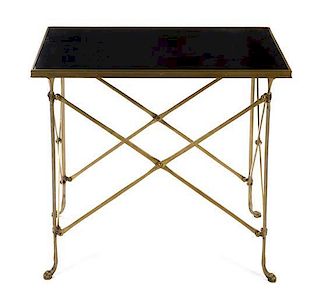 * A Neoclassical Style Brass Occasional Table Height 27 x width 30 x depth 19 inches.