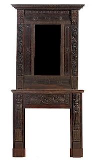 A Renaissance Revival Oak Fireplace and Overmantel Mirror Height overall 117 x width 56 x depth 17 inches.
