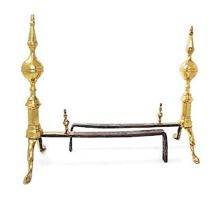 * A Pair of Brass Andirons Height 18 inches.