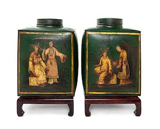 A Pair of Tole Canisters Height of canisters 15 1/2 inches.