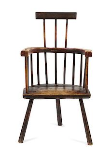 A George III Primitive Comb-Back Ash Armchair Height 41 inches.