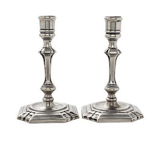 A Pair of Paktong Candlesticks Height 6 1/4 inches.