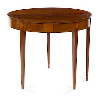A Sheraton Mahogany Flip Top Game Table Height 29 1/4 x width 36 1/2 x depth 18 inches (closed).