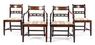 A Set of Eight Regency Style Mahogany Dining Chairs Height 32 3/8 inches.