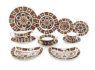 * A Partial Set of Royal Crown Derby Dinnerware Diameter of dinner plate 10 3/4 inches.