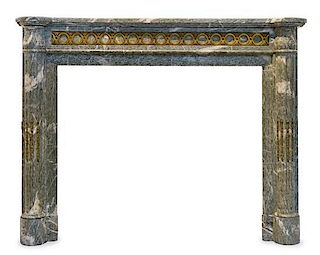A Louis XVI Style Gilt Bronze Mounted Marble Fireplace Surround Height 44 1/4 x width 57 1/2 x depth 15 3/4 inches.
