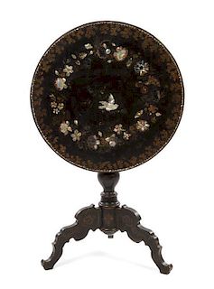 * A Victorian Mother-of-Pearl Inset Lacquered Table Height 26 x diameter 24 inches.