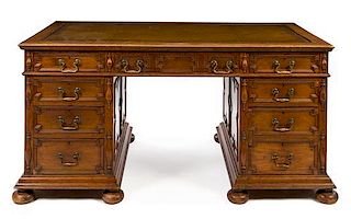 A William and Mary Style Walnut Pedestal Desk Height 30 1/2 x width 59 x depth 33 inches.