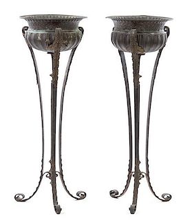 A Pair of Neoclassical Iron and Tole Jardinieres Height 45 3/4 inches.