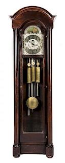An English Mahogany Four-Tube Tall Case Clock Height 92 inches.