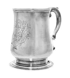 A George II Silver Cup, Mark of John Edwards, London, 1745, a baluster form with an engraved coat of arms on body raised on a ci