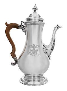 * A George III Silver Coffee Pot, likely Thomas Whipman and Charles Wright, London, 1767, of baluster form with an applied wood