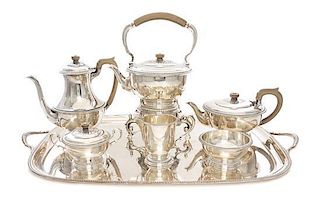 A George VI Silver Tea & Coffee Service, Edward Barnard & Sons Ltd., London, 1947, comprising a kettle on lampstand, a teapot, a