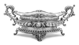 * A Continental Silver Jardiniere, Mid 20th Century, of oval form, raised on four scroll supports cast with rocaille flanked by