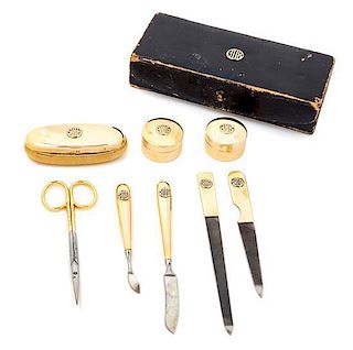 A French 14 Karat Yellow Gold Travel Manicure Set, Cartier, Paris, Early 20th Century, comprising two circular boxes, two nail f