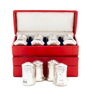 * A Set of Eight Silver Casters, Cartier, New York, 20th Century, each of tapering octagonal form, in two fitted boxes.