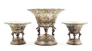 * An Assembled Three Piece Silver Garniture, 19th/20th Century, each having a reticulated bowl raised on a geese-formed support,