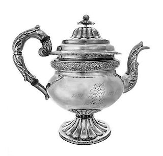 * An American Coin Silver Coffee Pot, Stodder & Frobisher, Boston, First Quarter 19th Century, of baluster form with foliate cas