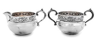 * A Silver Sugar and Creamer Set, Gorham Mfg. Co., Providence, RI, 20th Century, each with a stylized foliate band.