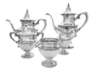 * An American Silver Tea and Coffee Service, Artcraft, 20th Century, comprising a coffee pot, a teapot, a covered sugar, a cream