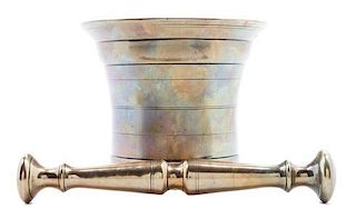 A Brass Mortar and Pestle Height of mortar 5 1/4 inches.